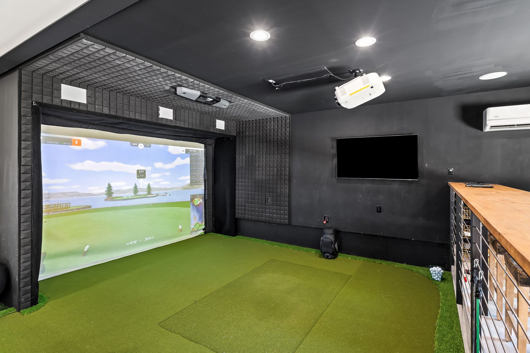 Detached retreat with golf simulator